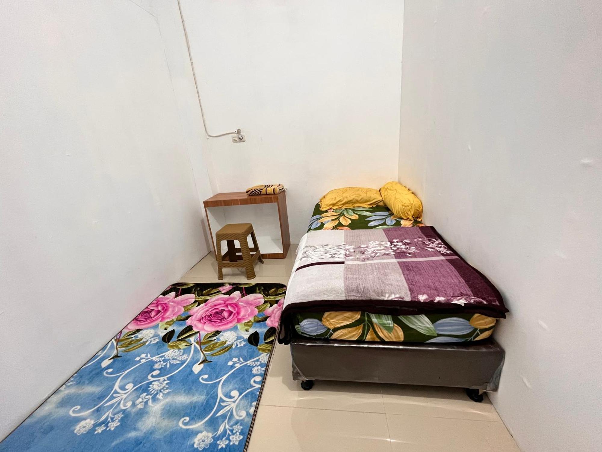 Rumah 25 Syariah Bukittinggi Szoba fotó